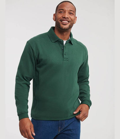 Russell Athletic 012M Heavy Duty Collar Sweatshirt worn by a model in Bottle Green