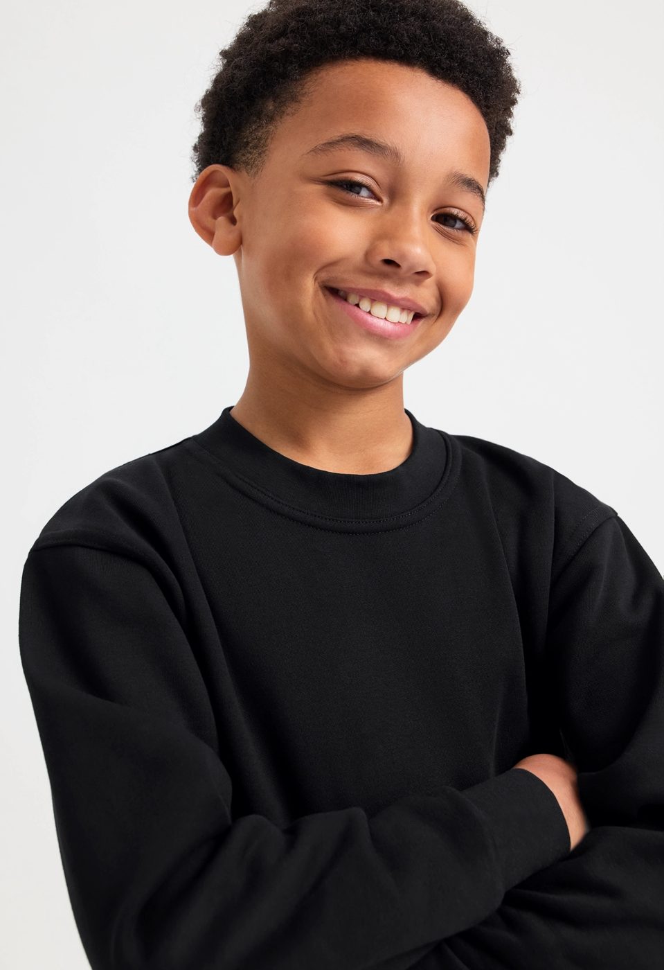 Uneek UC202 childrens sweatshirt modelled