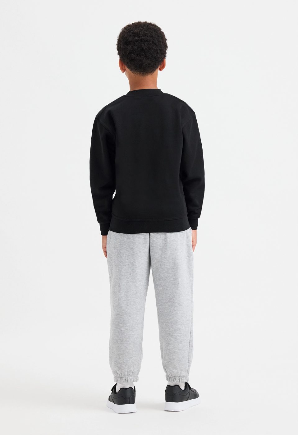 Uneek UC202 childrens sweatshirt modelled