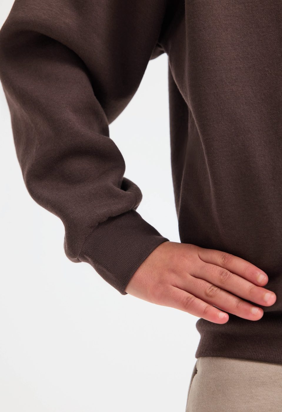 Uneek UC206 childrens V neck sweatshirt modelled