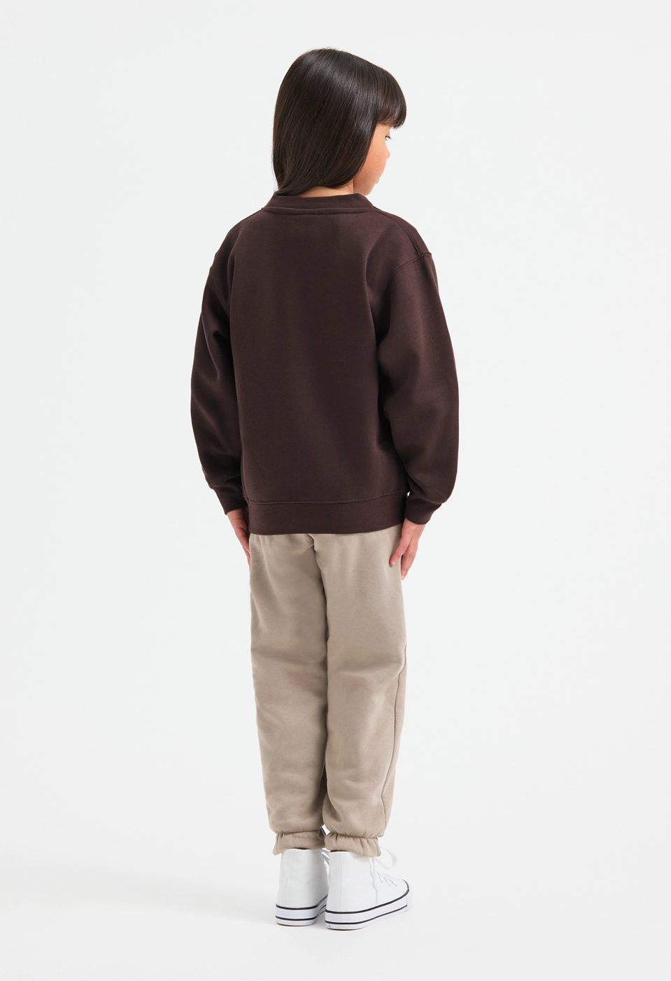 Uneek UC206 childrens V neck sweatshirt modelled